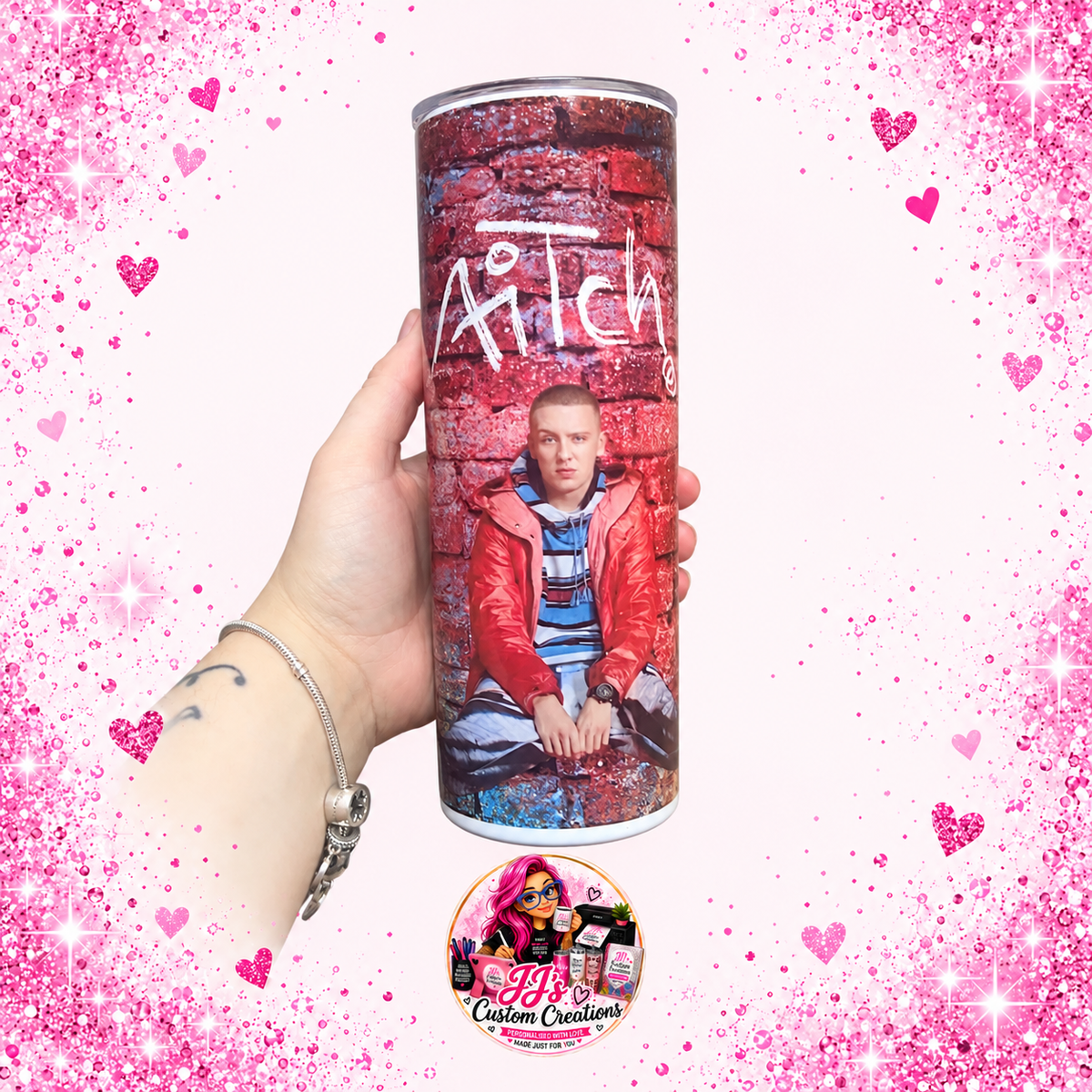 Aitch-inspired tumbler on the approved light pink sparkle background