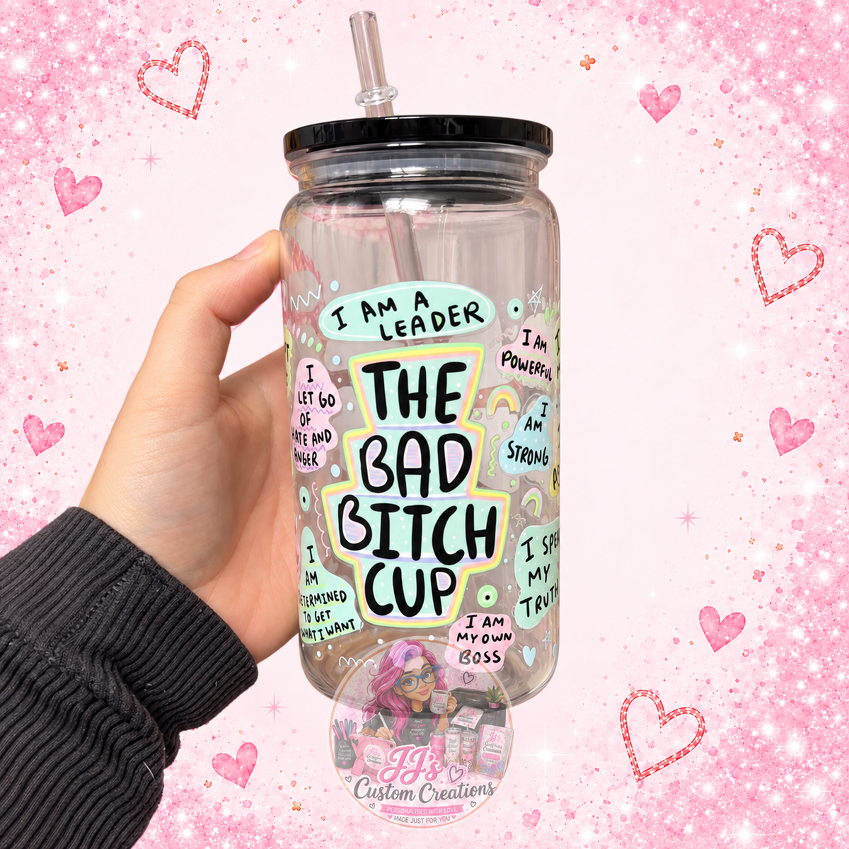 Bad Bitch plastic Libbey-style cup with straw on JJ’s blush pink sparkle background