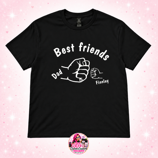 Black Best Friends fist bump T-shirt with Dad and Finnley on a light blush sparkle background