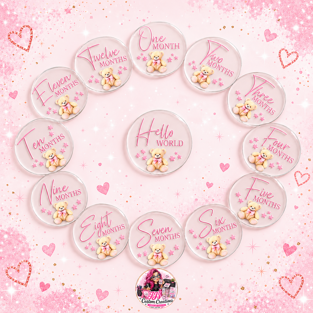 Complete neutral pink baby milestone disc set from Hello World to Twelve Months on a square pink sparkle background