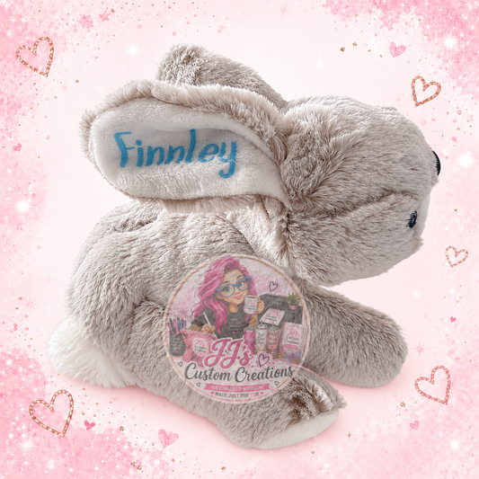 Personalised grey Finnley bunny teddy on JJ's pink sparkle background