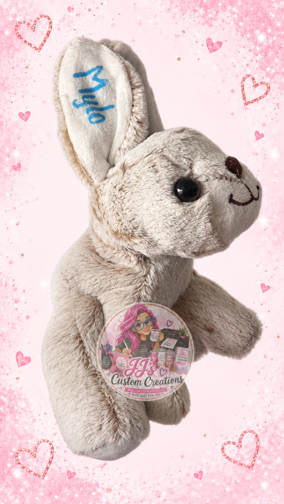 Personalised Mylo grey bunny teddy on JJ's pink sparkle background