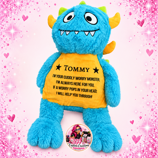 Blue personalised Worry Monster teddy named Tommy on a pink sparkle background
