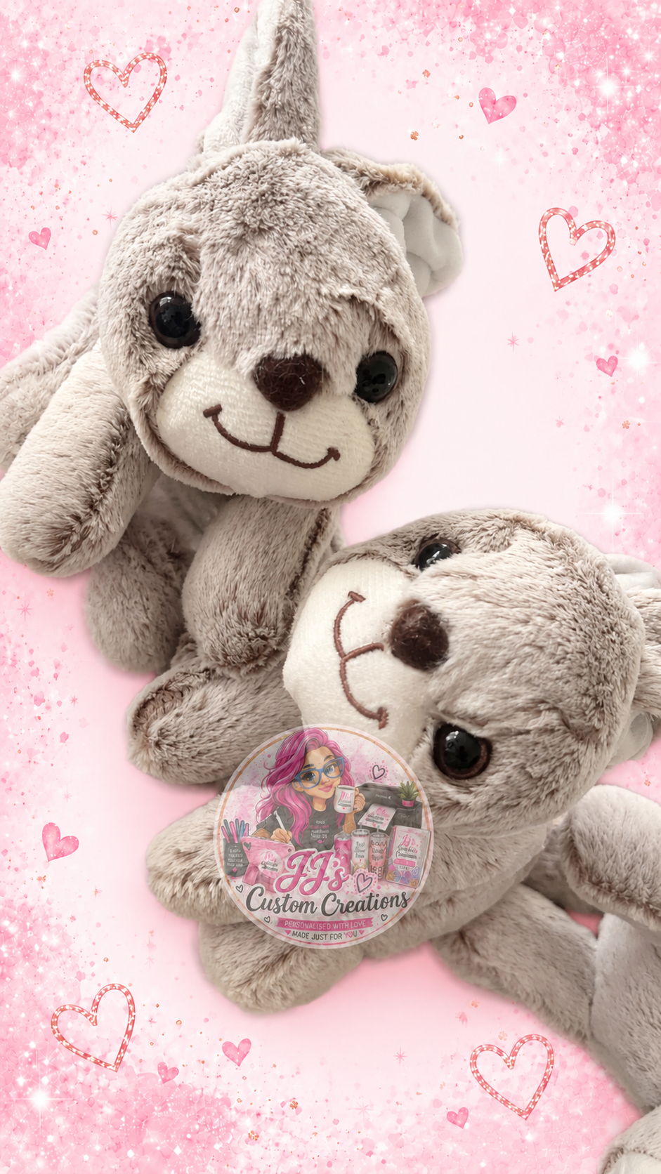 Two grey bunny teddies on JJ's pink sparkle background